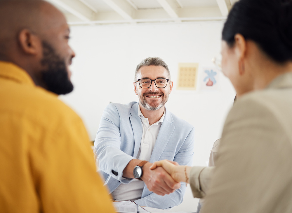 happy business people handshake and interview in m 6fpds75